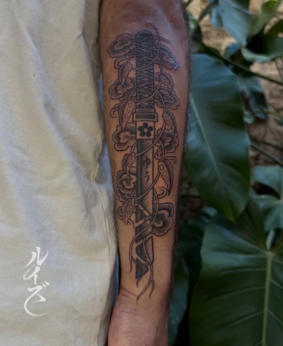Decorative dagger tattoo on the forearm by Luise (Lulu)