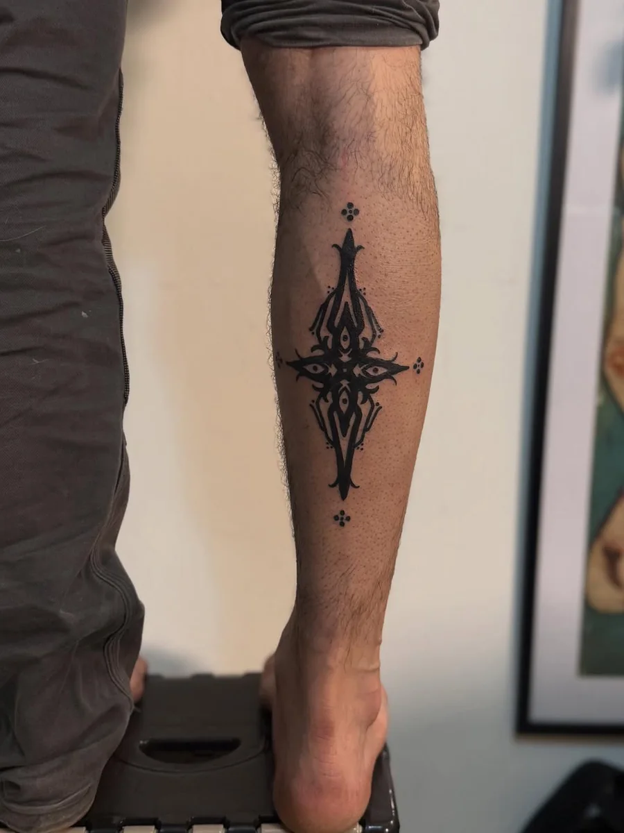 Pointed ornamental blackwork tattoo on the forearm by Yonatan